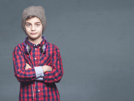 Portrait of a trendy young boyの写真素材