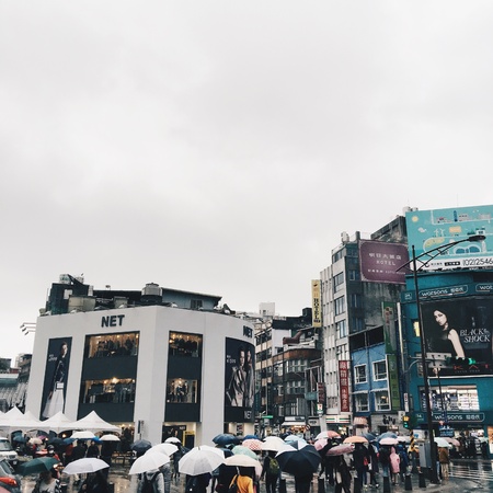 People walking and holding umbrella, raining day in Taipei, Taiwanの素材
