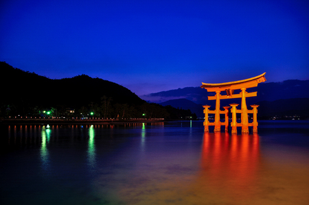 Itsukushima Shrine at nightの写真素材