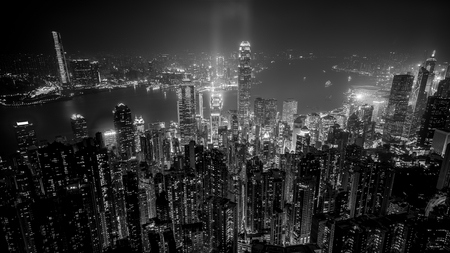 Hong Kong Victoria Harbor day and nightの写真素材