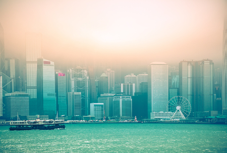 Hong Kong Victoria Harbor day and nightの写真素材
