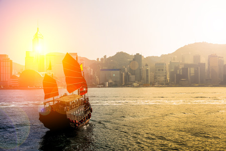Hong Kong Victoria Harbor day and nightの写真素材