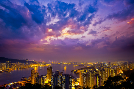 Hong Kong Victoria Harbor day and nightの写真素材