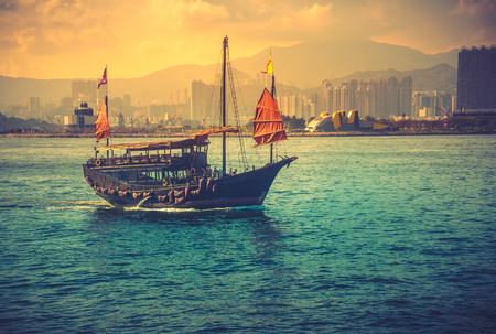 Hong Kong Victoria Harbor day and nightの写真素材