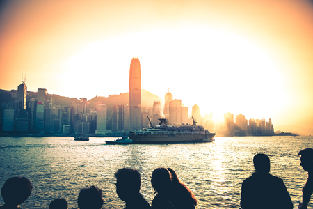 Hong Kong Victoria Harbor day and nightの写真素材