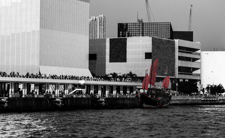 Hong Kong Victoria Harbor day and nightの写真素材