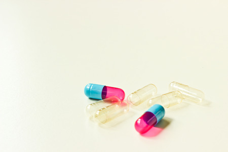 Blank Capsules Isolated on the White Background