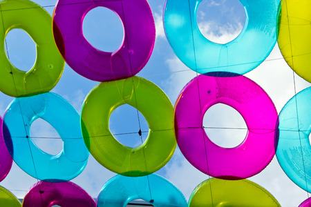 The Colorful Rubber Rings on the Sky backgroundの写真素材