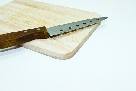 Knife and Chopping Board Isolated on the White Backgroundの写真素材