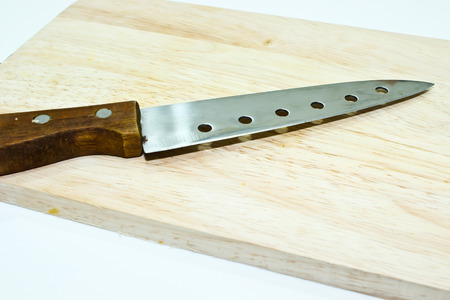 Knife and Chopping Board Isolated on the White Backgroundの写真素材