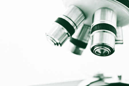 Objective Lens of Microscope Isolated on the White Backgroundの写真素材