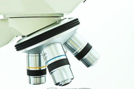 Objective Lens of Microscope Isolated on the White Background