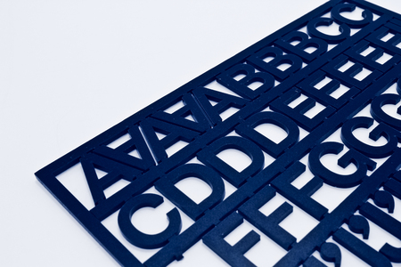 The Black Color Alphabets Isolated on the White Background