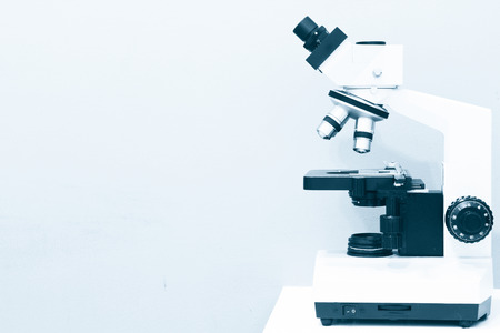 Microscope on the Table in Laboratory Roomの写真素材