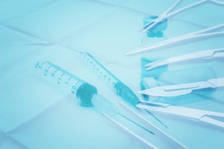 Surgical Instruments on the Green Fabricの写真素材