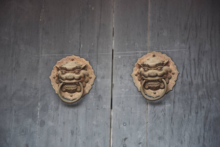 Close up view to an ancient copper door knob