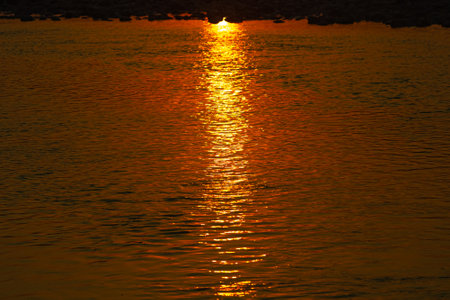 A Molten Gold river and sun set