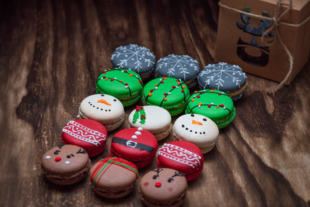 Christmas macarons on a wooden background. Selective focus. Holiday.の写真素材