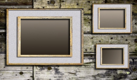 Cracked frames on wooden background