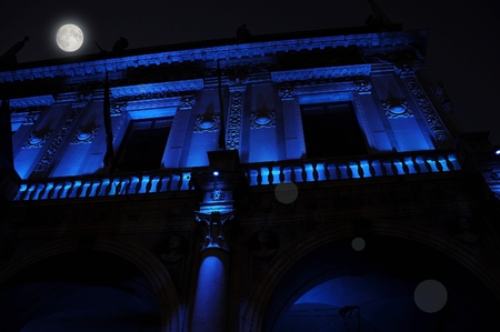 Nocturnal renaissance architecture in blue light. Piazza Loggia. Today seat of the city council City Hall of the city of Brescia, Italy.のeditorial素材