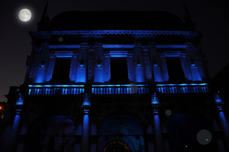 Nocturnal renaissance architecture in blue light. Piazza Loggia. Today seat of the city council City Hall of the city of Brescia, Italy.のeditorial素材