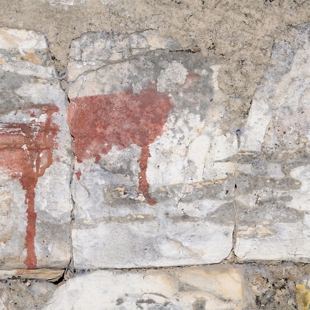 Red drop stained stone wallの写真素材