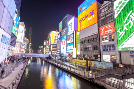 OSAKA, JAPAN - MARCH 19, 2017 : Dotonbori is one of Osaka's most popular tourist destinations, this street runs parallel to the Dotonbori canal. It is a popular shopping and entertainment districtのeditorial素材