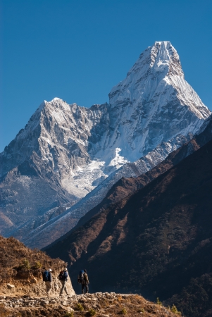 Trekking in Himalayas, with Ama Dablam peak in background, Nepalの写真素材