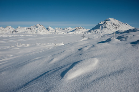 Winter snowy landscape of Kulusuk, small village in Greenlandの写真素材
