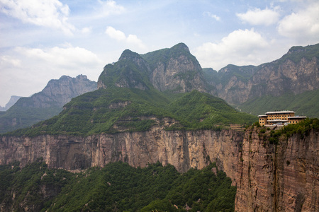 Tianjie Mountain and the tourist hotel on the cliffのeditorial素材