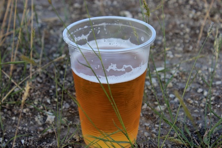 a glass of beer on the natureの写真素材