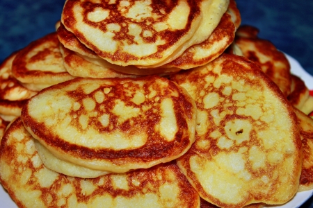 Ruddy fresh pancakes on a plateの写真素材