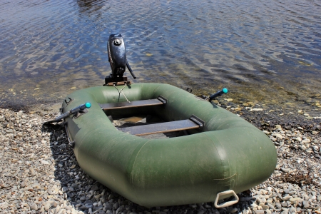 Rubber boat with a motor on the Volgaの写真素材