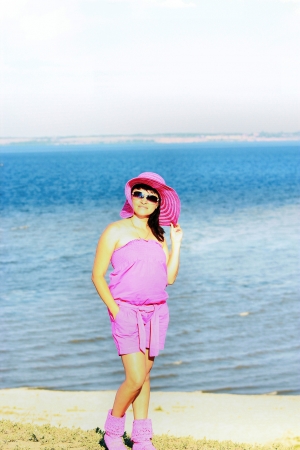 Woman standing on beachの写真素材