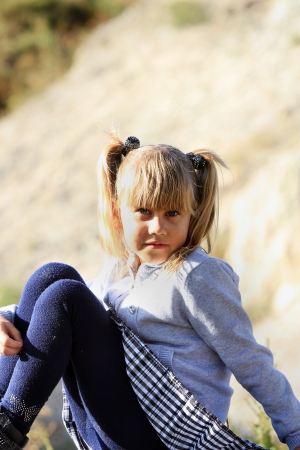 Blonde girl relaxing in natureの写真素材