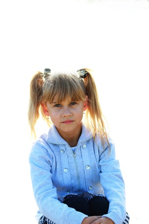 Portrait of a serious little girlの写真素材