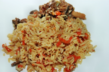 Pilaf with meat on the plateの写真素材