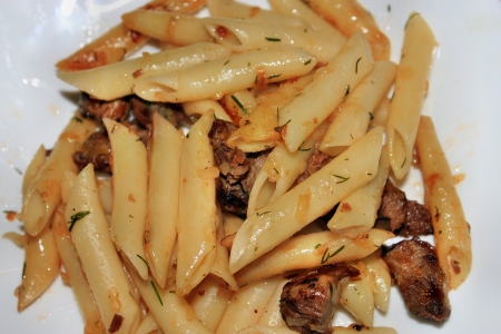 The finished dish, pasta with meatの写真素材