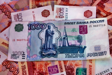 Thousand close-up on the background of five thousandth of moneyの写真素材