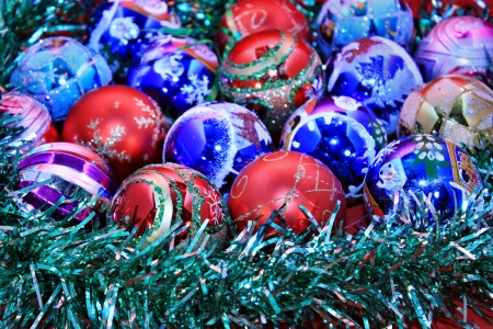 New Year's background with Christmas tree balls and golden tinselの写真素材