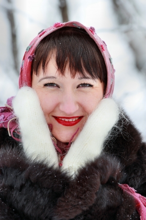 Portrait of a beautiful girl in a winter forestの写真素材