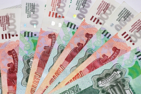 Five thousand and thousand bills spread out like a fanの写真素材