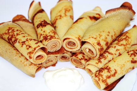 Carnival  Pancakes with sour cream on the plateの写真素材
