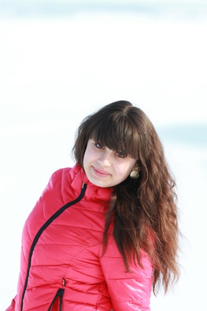 Pretty young brunette in a winter clothesの写真素材
