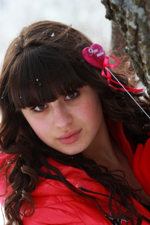 Girl with heart in handの写真素材