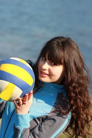 Portrait of a young girl with a volleyball Ballの写真素材