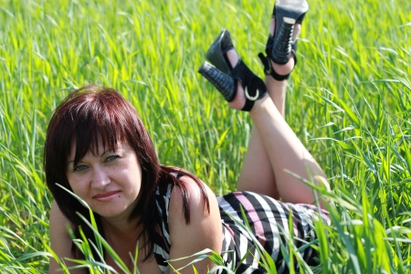 Cute girl resting in natureの写真素材