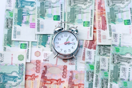 Alarm clock and Russian moneyの写真素材