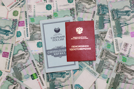 Background of the pension certificate and savings on knizhkai background thousandths billsの写真素材
