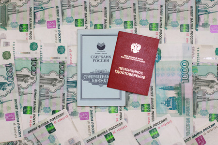 Pension certificate and savings book background thousandths billsの写真素材